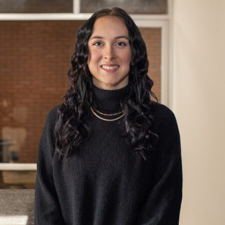 Headshot of Evie Rodgerson, Digital Marketing Specialist on the MouthWatch team.